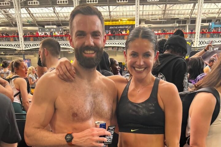 Lucy Gornall next to Paul Ratcliffe after completing a HYROX